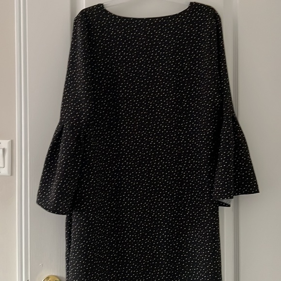 Black colour blouse with white and brown tiny dots are there on it . - Picture 4 of 4